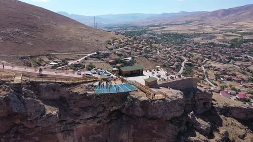 Aerial View Of People Enjoying The View On The Glass Terrace On The Hill