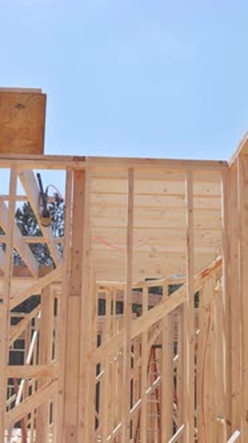 Beams Framed in Wooden Framework Under Construction of a New House