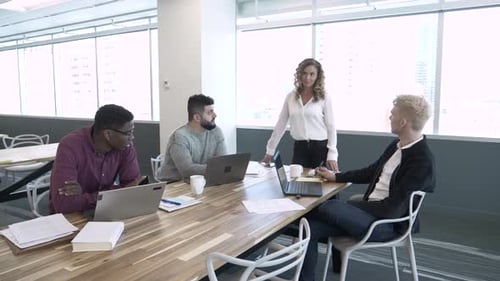 Diverse business team collaboration in modern coworking office space