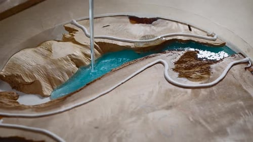 Crafting a Wooden River Table with Blue Resin