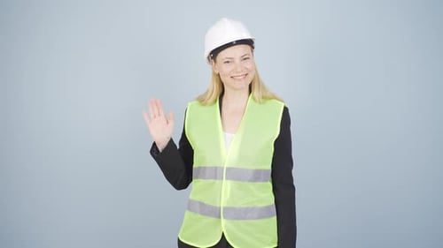 Engineer waving at camera.