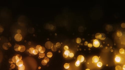 Glamour Collection: Golden bokeh rising from bottom on a dark background