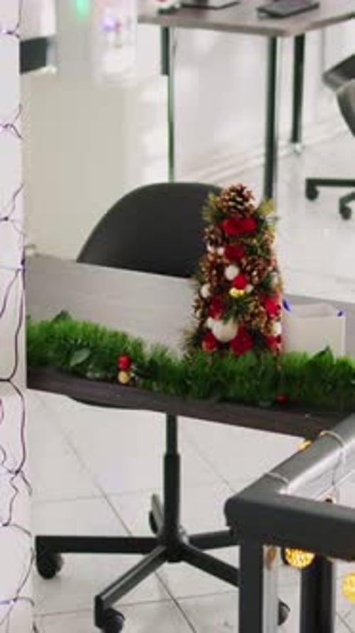 Vertical Video Zoom in on Christmas Tree in Office