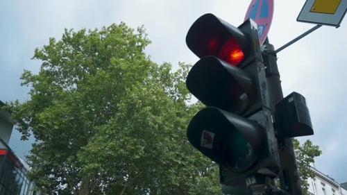 Creative Shot Pedestrian View of Traffic Lights Turning Red to Green