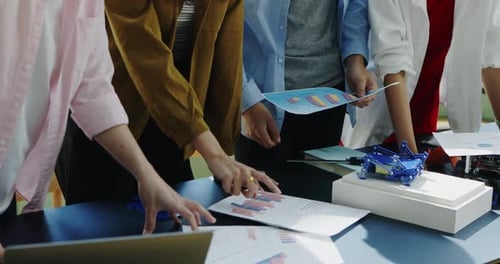 Group of Asian young business people have discussion meeting in office