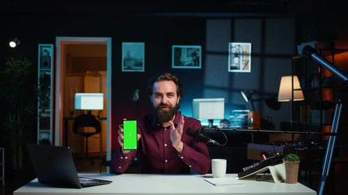 Content Creator Reviewing Mockup Phone Received From Sponsor Close Up