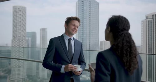Business People at Conference Meeting and Talking on Office Rooftop