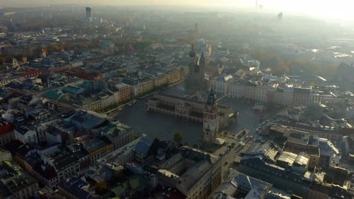 Establishing Aerial Shot of St. Mary's Basilica in Krakow's Old Town.