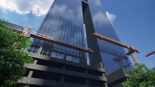 Edificio de gran altura con una grúa amarilla