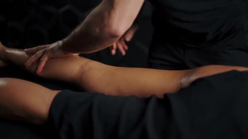 Woman Getting a Relaxing Leg Massage