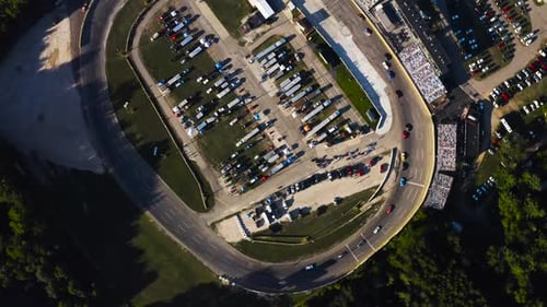 Cars Race Around Track at High Speed