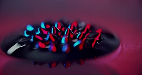 fluid forming spikes in a dark abstract atmosphere