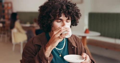 Thinking, man or drinking tea in cafe for wellness, contemplating or day dreaming on weekend