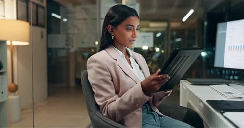 Business woman, analyst and tablet for night data analysis, planning and market trends in office