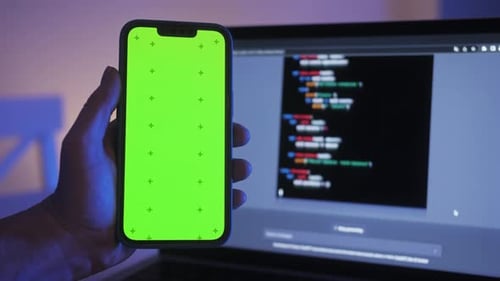 Phone with Chroma Key Green Screen with Man Working with Chatbot AI Online Connecting with AI and
