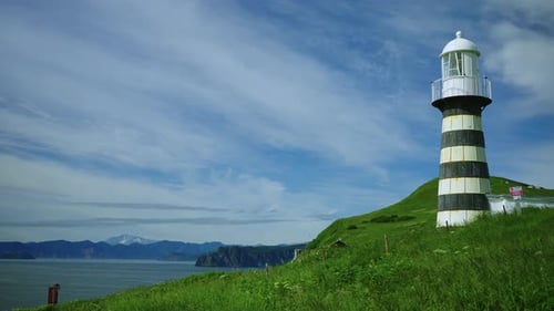 Travelling In Beautiful Touristic Place Fascinating Landscape With Old Lighthouse On Shore Of Sea