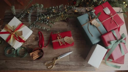 Christmas Presents Arranged on Table Top-Down Shot