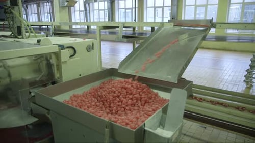 Red Candy Making Machine in Factory Setting