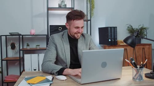 Businessman Freelancer at Office Workplace Start Working on Laptop Computer Sends Online Messages