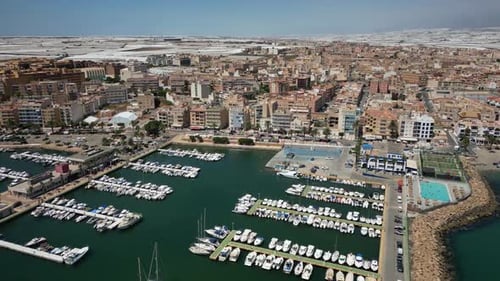 Aerial views of the fishing and maritime port of Roquetas de Mar, Andalucia and its beaches