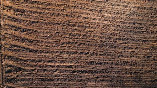 Aerial View of Deeply Furrowed Tilled Agricultural Field