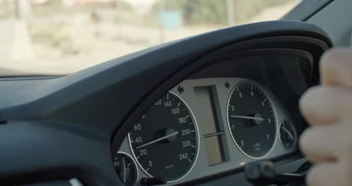 Closeup of the Car Speedometer the Arrow Rises to the Top of the Acceleration