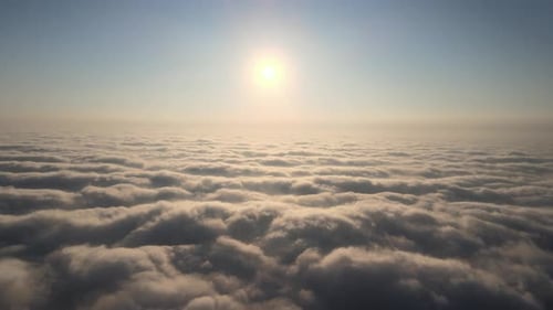 Aerial View of Clouds Under a Sunny Sky