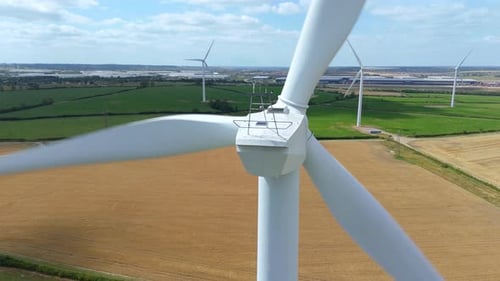 Aerial view of wind turbines in fields, United Kingdom.