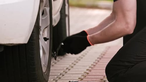 Mechanic Fixes Car