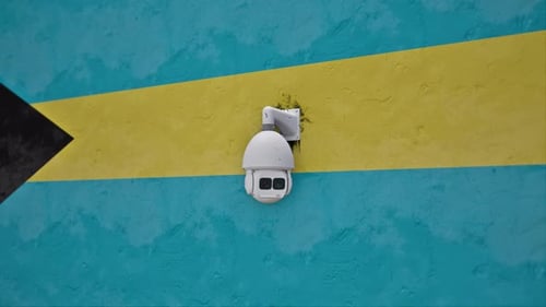 Bahamas Flag with Panning CCTV Security Camera
