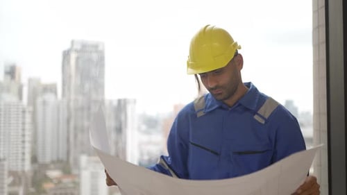 Engineer is working at tower.