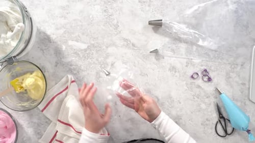 Flat Lay Step By Step Transfering Meringue Mix Into Piping Bags with Metal Tips to Bake Unicorn