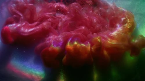 Red and Gold Ink Cloud Spreading in Space