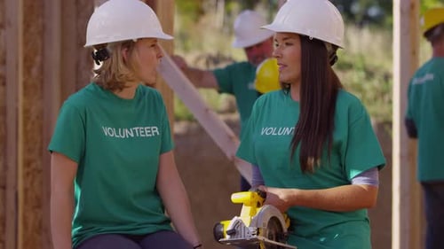 Volunteers at a Construction Site with Hard Hats