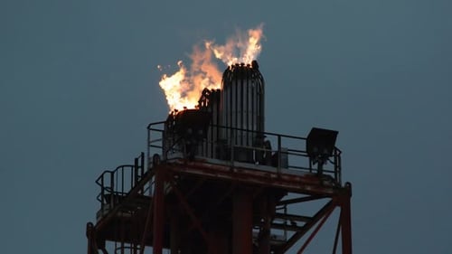 An industrial chimneys with fire