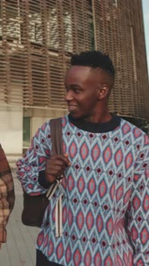 Guys students having fun talking walk down the street