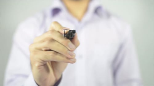 Hand Writes Time To Learn on Clear Surface