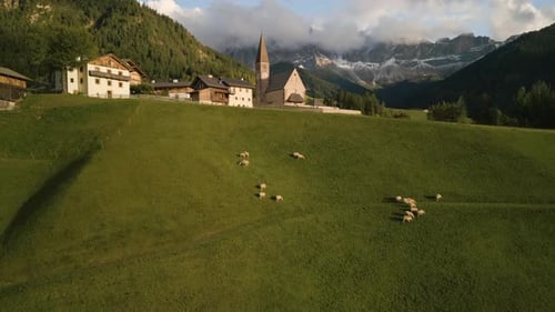 Santa Maddalena village with church and beautiful Dolomiti mountains