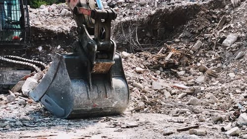 Bulldozer Removes Debris From A Collapsed House 4