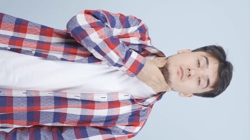 Young Adult Man with a Sore Throat