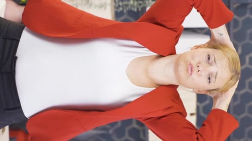 Stressed Woman With Hands on Head