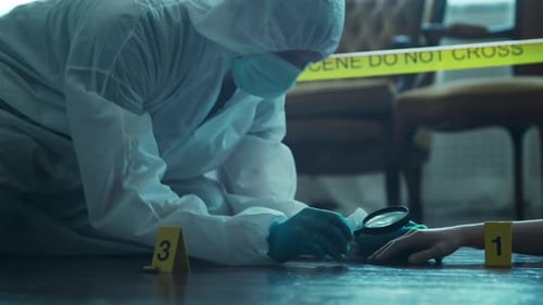 Crime Scene Investigator Examining Evidence at Crime Scene