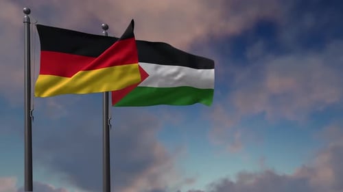 Realistic Flags of Germany and Palestine Waving Against Blue Sky
