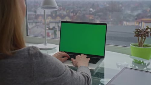Businesswoman Using Laptop Works at Home Office