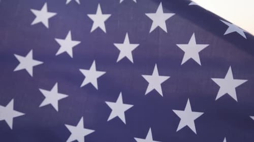 American Flag Waving on Sunset