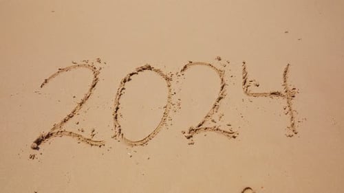 Sand With The Year 2024 Written On It