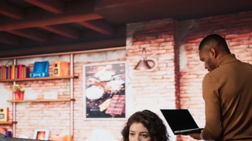 Artificial Intelligence Company Worker Arriving in Office with Laptop