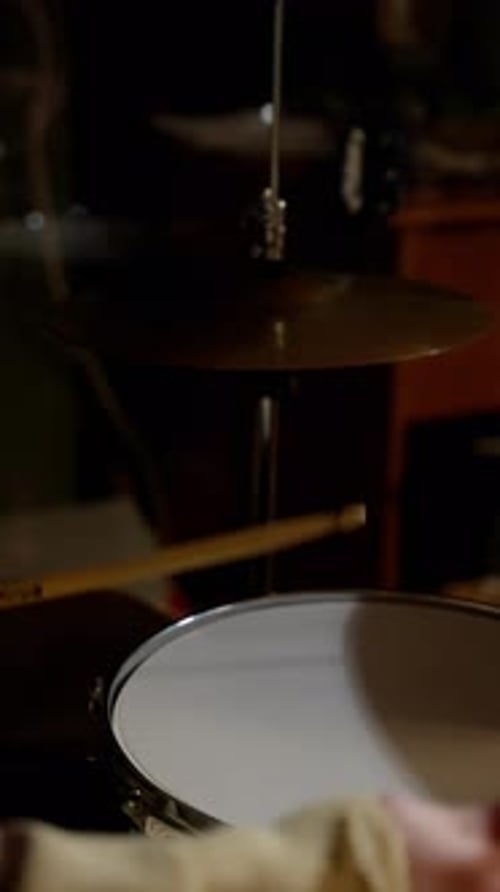 Drummer Plays Set in Studio at Night
