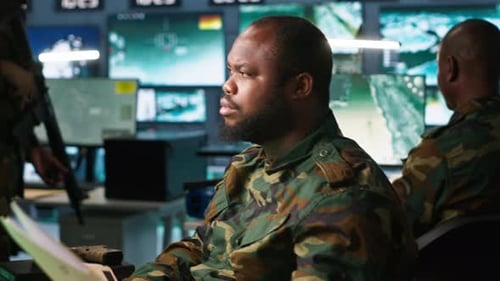 Counterintelligence Specialist in Military HQ Base Gathering Information