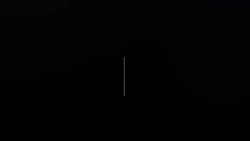 Taper à l'écran avec un paragraphe clignotant formant le mot Texte, en blanc sur fond noir